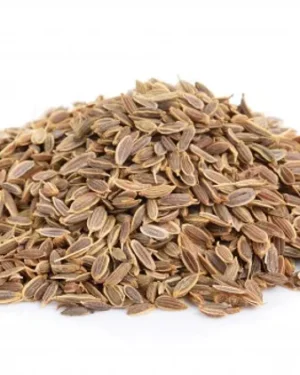 A small pile of Caraway seeds is scattered on a white background. The seeds are oblong with a slightly curved shape and have a light brown color with darker brown lines running along them, reminiscent of natural caraway.