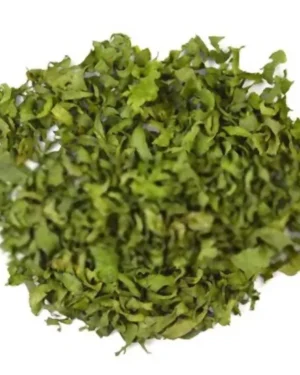 A pile of finely chopped dried celery leaves from the "Celery" product is scattered against a plain white background. The Egyptian leaves appear vibrant green, perfect for the food industry.
