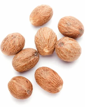 A collection of eight whole "Nutmeg" seeds, featuring a rough, textured, brown outer shell, is displayed against a white background. The oval-shaped seeds are mottled and vary slightly in size, highlighting the quality of nutmeg sourced from Egypt.
